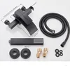 A black bathtub faucet set with a showerhead and accessories laid out on a white background with dimensions indicated by lines and numbers. Náhled obrázku produktu