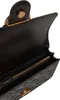 Close-up view of the interior of a black handbag. Náhled obrázku produktu