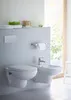 A modern bathroom with a wall-mounted toilet and bidet. Produktbild-Vorschau