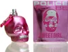 A pink, glittery skull-shaped perfume bottle and its matching box are displayed against a white background. Anteprima dell’immagine prodotto