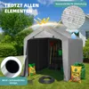 A grey storage tent is set up in a garden with gardening supplies around it. Náhled obrázku produktu