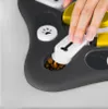 A hand is shown interacting with a dog toy, dispensing kibble. Produktbild-Vorschau