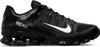 A black Nike Reax 8 Tr Mesh sneaker with a white Nike swoosh logo is shown from the side against a white background. Anteprima dell’immagine prodotto