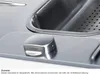 A close-up view of a stainless steel sink with a control knob. Podgląd zdjęcia produktu