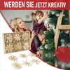 A family decorating a Christmas tree with straw ornaments. Produktbild-Vorschau