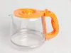 A clear glass coffee pot with an orange lid and handle against a white background. Produktbild-Vorschau