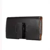 A black leather phone holster with a belt clip is shown against a white background. Produktbild-Vorschau