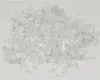 A pile of clear plastic clips on a white background. Produktbild-Vorschau