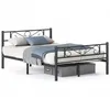 A black metal bed frame with a headboard and footboard, featuring decorative scrollwork. The bed is made with a mattress, pillows, and a blue throw blanket. Two grey storage boxes are placed underneath the bed frame. The background is white. Náhled obrázku produktu