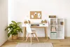 A home office setup with a desk, chair, plant, and bookshelf. Produktbild-Vorschau