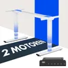 A white electric standing desk frame with blue accents and a black control panel, set against a light gray and blue background. Text overlays highlight features. Produktbild-Vorschau