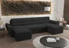 A dark gray U-shaped sectional sofa is shown in a modern living room setting, with a textured wall art and a coffee table in the foreground. Náhled obrázku produktu