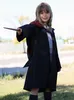 A young girl dressed as Hermione Granger from Harry Potter, holding a wand. Produktbild-Vorschau