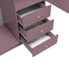 A close-up view of three open drawers of a plum-colored cabinet with gold knobs. Podgląd zdjęcia produktu