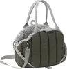 A green and gray pet carrier bag with a fluffy interior, shown against a white background. Náhled obrázku produktu