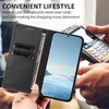 A person is holding a phone case with a phone inside, and a credit card reader is visible in the background. Produktbild-Vorschau