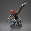 A statue of a dinosaur on a rocky, icy base. Podgląd zdjęcia produktu