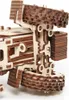 Close-up view of a wooden tractor model, focusing on the gears and mechanical components. Náhled obrázku produktu