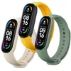 Three Xiaomi Mi Smart Band 6 straps in different colors are displayed. Voir les images du produit