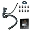 A collection of plumbing parts for a kitchen sink, including a drain assembly, flexible hose, and mounting clips, laid out on a white background. Produktbild-Vorschau