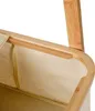 A close-up view of the top edge of a laundry basket or garment rack, showing the bamboo frame and beige fabric lining. Anteprima dell’immagine prodotto