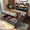 A modern bedroom with a bed featuring a storage headboard and under-bed storage. Podgląd zdjęcia produktu
