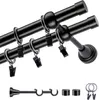 A close-up, angled view of a black double curtain rod with rings and clips, against a white background. Below are separate components of the curtain rod system. Produktbild-Vorschau