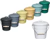 A collection of colorful buckets with lids and handles, arranged in a diagonal line and a separate group in the foreground. Produktbild-Vorschau