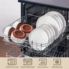 A dishwasher rack filled with plates and bowls. Produktbild-Vorschau
