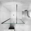 A modern bathroom with a glass shower wall. Produktbild-Vorschau