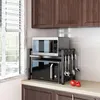 Two microwaves are displayed on a shelf unit on a kitchen counter. Produktbild-Vorschau