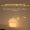 A glowing mushroom-shaped night light is placed on a surface, with text describing its features. Podgląd zdjęcia produktu