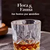 A close-up shot of a glass of amber liquid, likely whiskey, with text overlay. Produktbild-Vorschau
