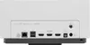 The back panel of a white projector with various ports and labels. Voir les images du produit