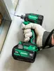 A person wearing gloves is using a HiKOKI cordless impact driver to screw into a metal frame. Voir les images du produit