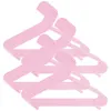 A stack of pink children's clothes hangers. Produktbild-Vorschau