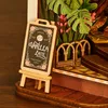 Rolife 3D-Holz-Puzzle Book Nook 'Holiday Café' Produktbild-Vorschau 15