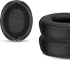 Two black headphone ear pads are shown against a white background. One ear pad is shown from the front, revealing the inner mesh, while the other two are stacked and shown from the side. Podgląd zdjęcia produktu