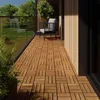 A balcony with wooden deck tiles, a chair, and plants. Náhled obrázku produktu