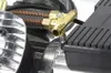A close-up view of the components of an air compressor, focusing on the brass fittings and hoses connected to a black housing. Anteprima dell’immagine prodotto