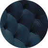 A close-up view of the tufted upholstery of a navy blue armchair. Produktbild-Vorschau