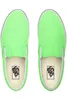 A top-down view of a pair of neon green Vans slip-on shoes. Voir les images du produit