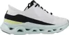 A side view of a white Skechers women's sneaker with black and light green accents. Voir les images du produit