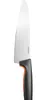 A Fiskars chef's knife against a white background. Podgląd zdjęcia produktu