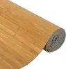 A rolled-up bamboo mat on a white background. Podgląd zdjęcia produktu