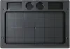 A top-down view of a black tool organizer with a grid pattern and several compartments at the top. Produktbild-Vorschau