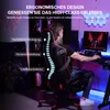 A man sitting in a gaming chair in a room with a computer and gaming setup. Produktbild-Vorschau