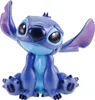 A blue Stitch figurine is sitting on a white background. Produktbild-Vorschau