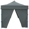 A dark grey pop-up tent with two open entrances, shown against a white background. Náhled obrázku produktu