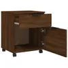 A brown oak-effect mobile filing cabinet with one drawer open and one door open, shown on a white background. Podgląd zdjęcia produktu